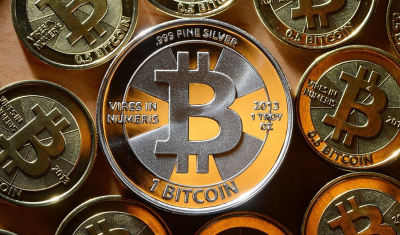 Биткоин под давлением торговых разногласий США и ЕС
